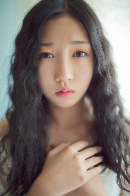 你的美丽却透出淡淡的忧伤