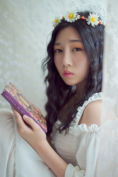 你的美丽却透出淡淡的忧伤