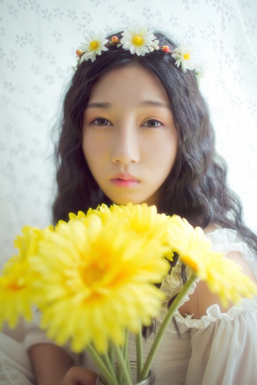 你的美丽却透出淡淡的忧伤