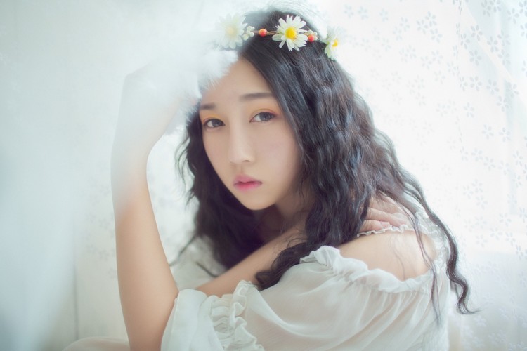 你的美丽却透出淡淡的忧伤