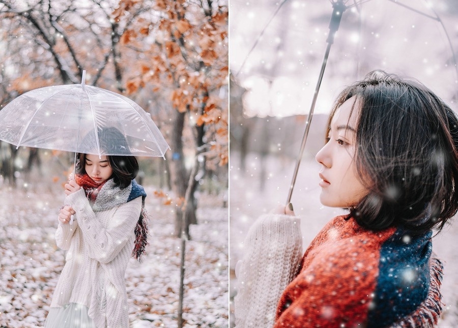 又一年大雪纷飞短发美女撑伞漫步楚楚动人