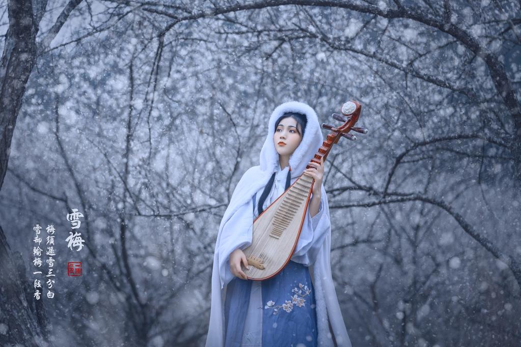 白衣古装美女漫天白雪唯美写真