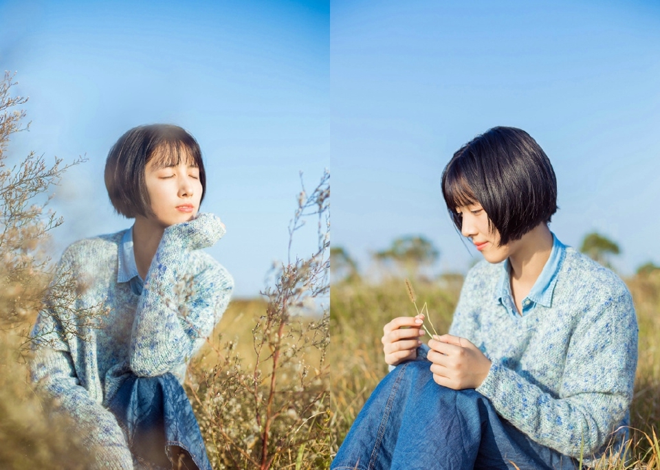 短发素雅美女户外草地上清新写真